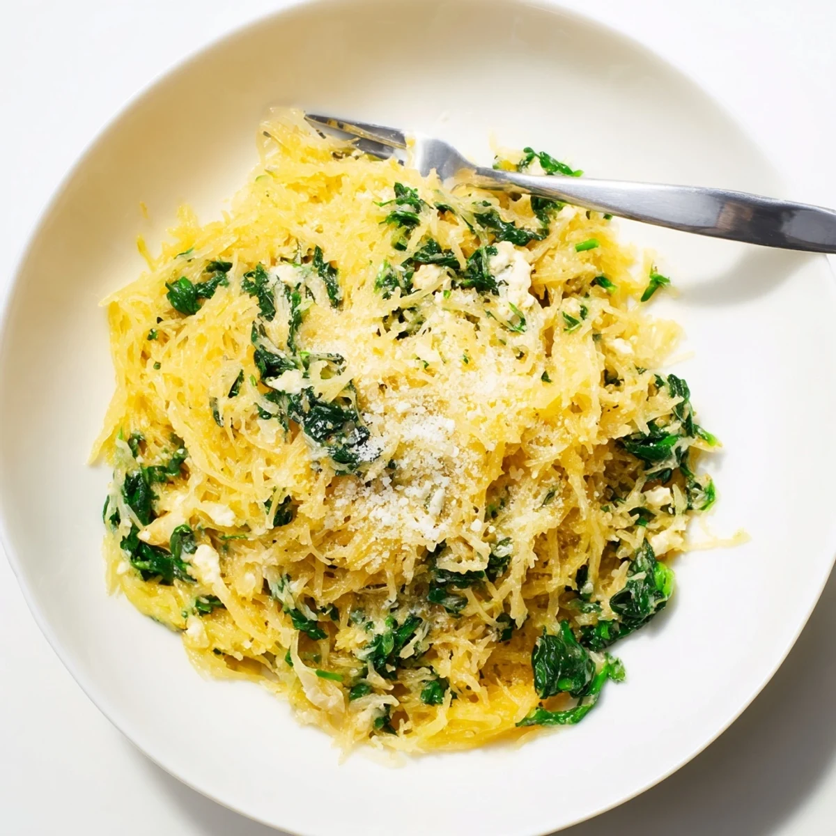Low-carb Boursin spaghetti squash comfort food featuring fluffy strands swirled with creamy herb cheese