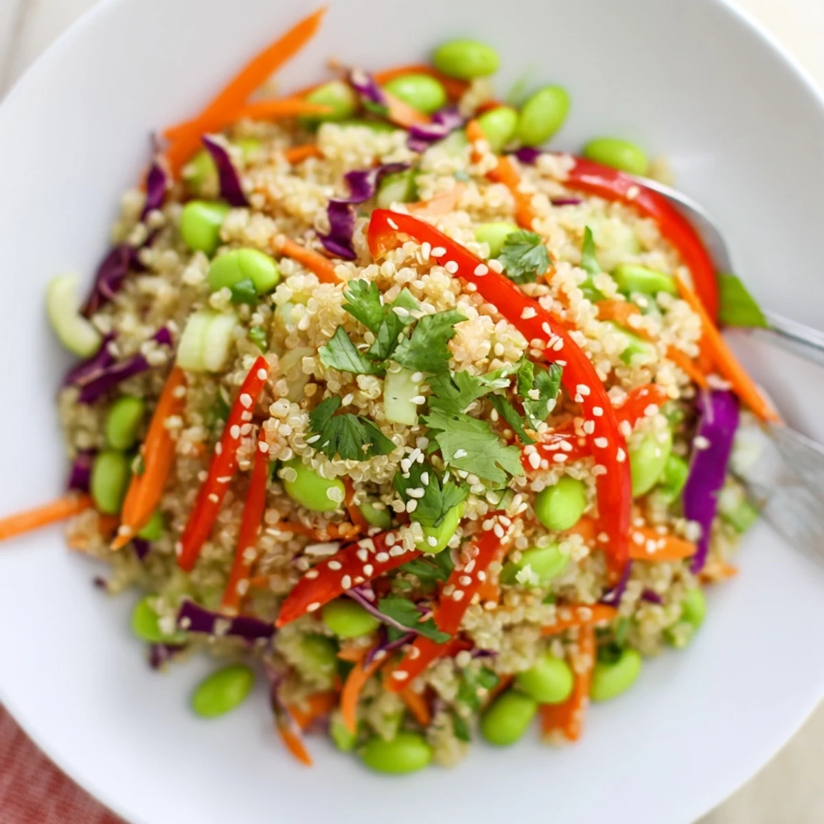 Bright Asian Dressing Quinoa Salad tossed with toasted sesame, crunchy peanuts, cilantro