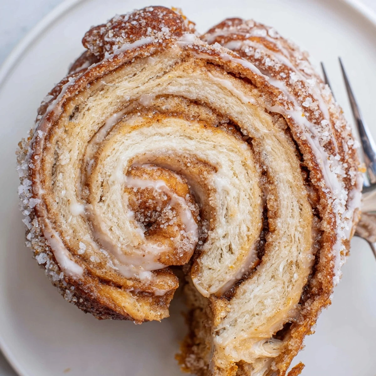 Warm Orange Cardamom Morning Buns Recipe served with zesty glaze and tea