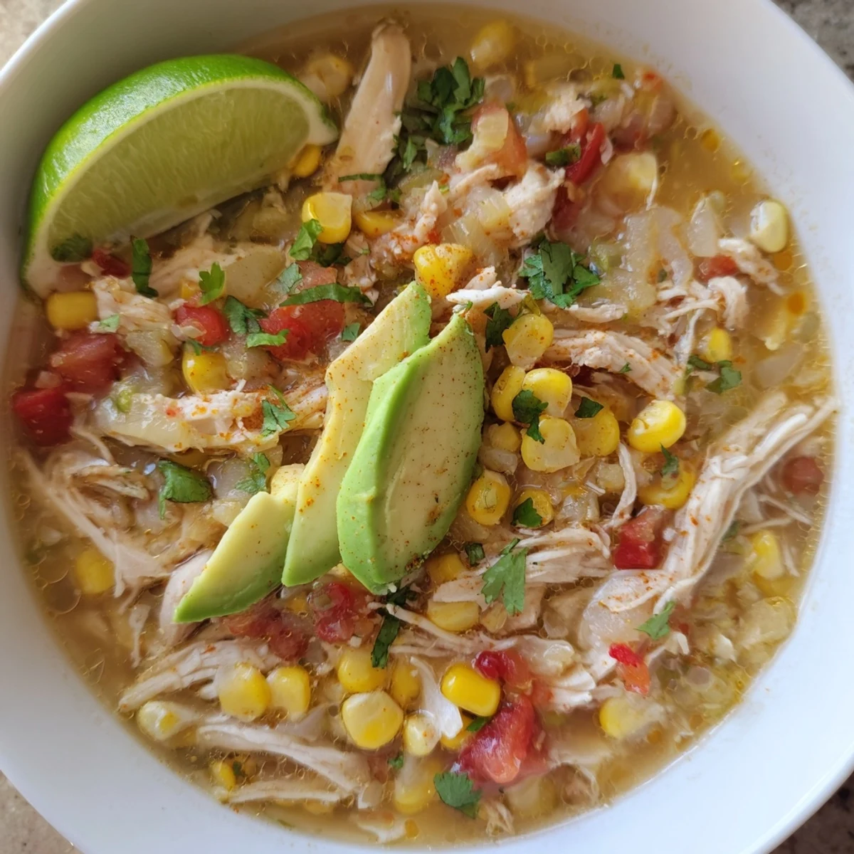 Bright citrus aroma in Bold Zesty Chicken Lime Soup Recipe, served with tortilla strips