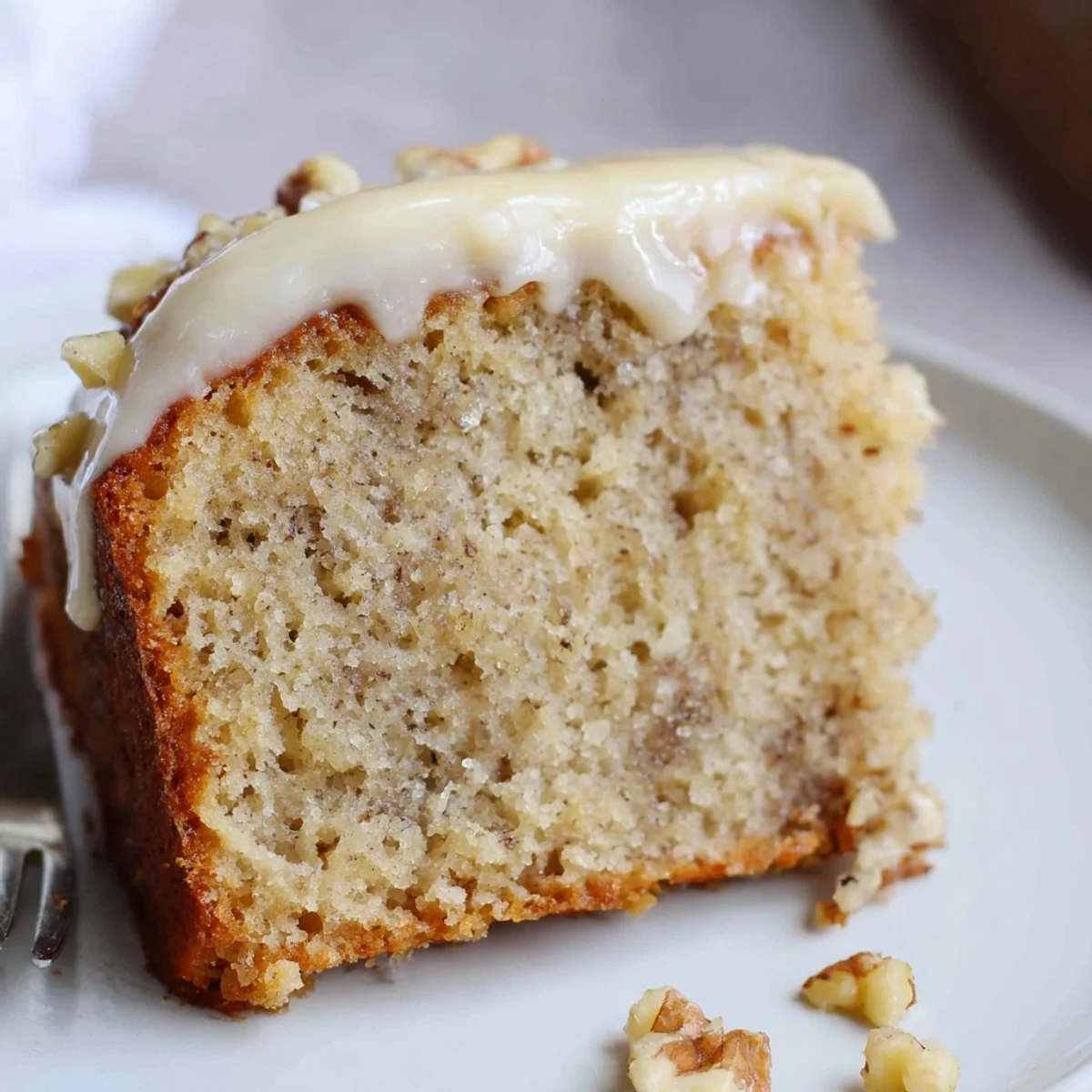 Moist Banana Cake cooling on wire rack, golden crumb and banana aroma.