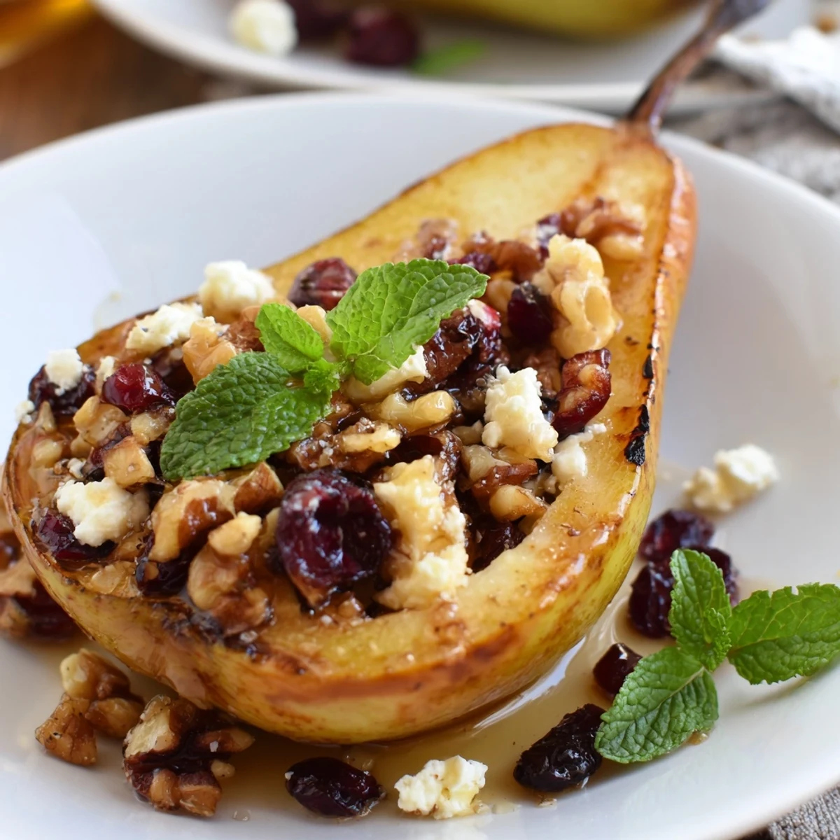 Baked Pears With Feta Honey Cranberries served warm with creamy feta and mint