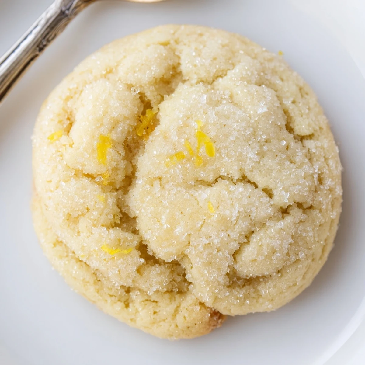 Soft Chewy Lemon Cookies cooling on a wire rack, zesty sugar crust  